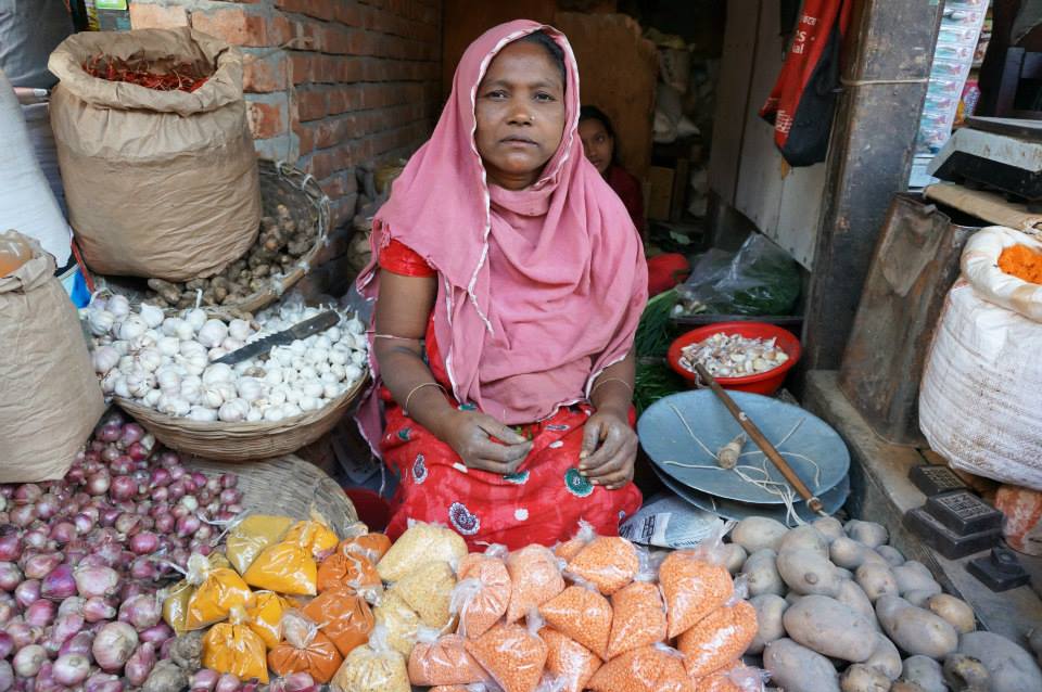 A lady selling vegetables in Bangladesh.